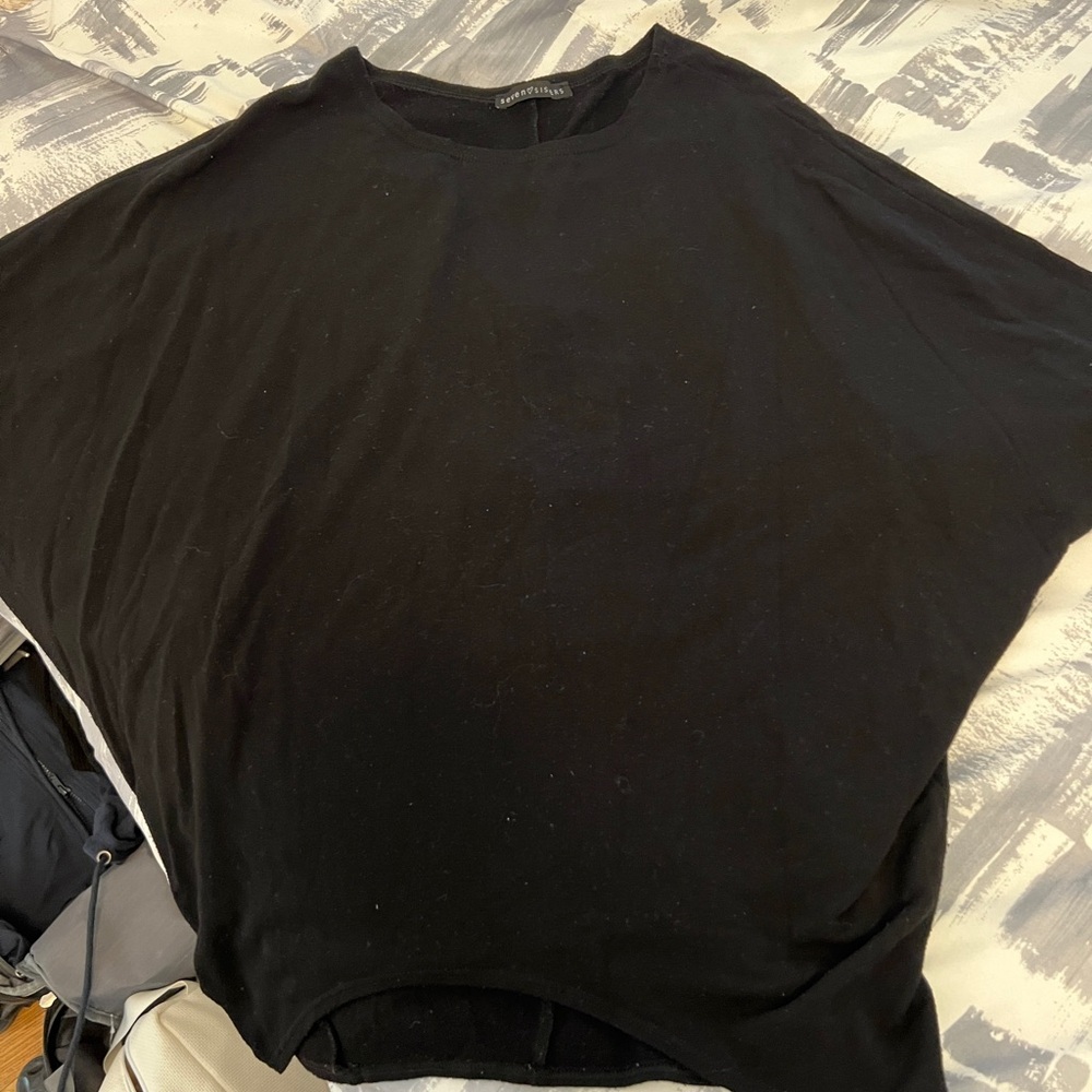 Long sleeve blackk winged top